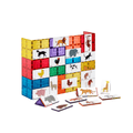 Magnetic tile wall decorated with Tile Tek animal puzzle toppers including a lion and elephant