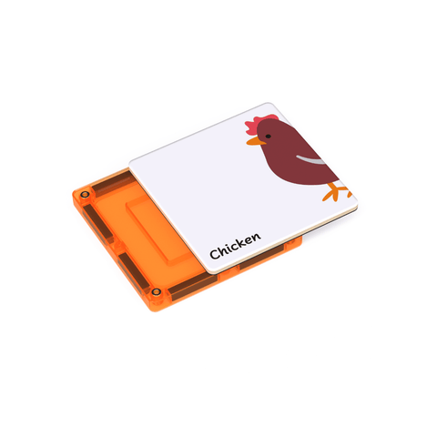 Tile Tek chicken puzzle topper sitting on an orange magnetic tile