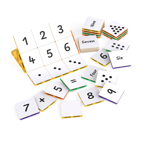 Flat lay of Tile Tek numeral, word and dot-pattern toppers with erasable squares