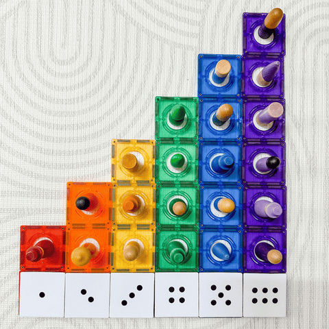 Rainbow magnetic tile staircase with Tile Tek dot-pattern toppers and peg dolls
