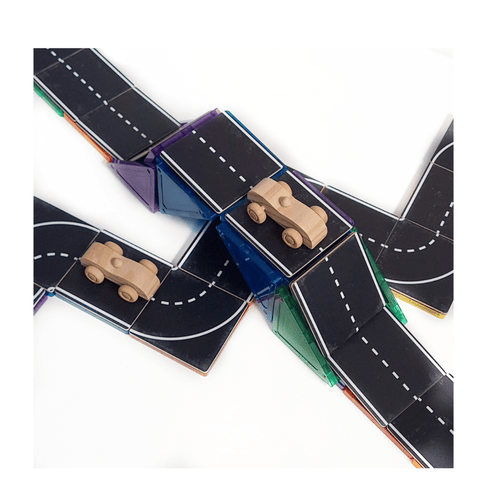 Two toy cars parked on Tile Tek road toppers over purple, green and orange tiles