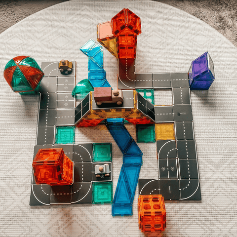 Magnetic tile structure with a dome roof connected by Tile Tek road toppers