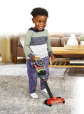 Toddler playing with the VTech Tidy Up Vacuum