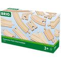 Image of the Brio World Expansion Pack Intermediate box for wooden train tracks by Brio. The packaging displays various track pieces, such as curved, straight, and intersection segments. A green label at the bottom signifies it is suitable for children aged 3 and above, making it perfect for enhancing your wooden railway system.