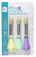 Packaging of the EC First Creations Easi-Grip Paint Brushes - Set of 3 by Early Creations, designed for children aged 12 months and up. These early childhood paint brushes feature bulbous handles in yellow, green, and purple for easy gripping. The package emphasizes safety, development, and easy control for little hands.