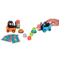 The Fat Brain Toys Forklift Frenzy by Fat Brain Toys features two toy forklifts, one orange and one blue, actively stacking vibrant discs. A hand maneuvers the blue forklift in a lively scene of bustling forklifting. With five challenge cards and a collection of colorful discs scattered around the forklifts, this toy set is excellent for honing fine motor skills.