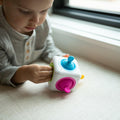 Close-up of the Tugl Cube's silicone bubbles and pull tabs