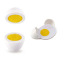 The Hape Egg Carton by Hape is a cleaning sponge set styled to resemble hard-boiled eggs. This set features a white container mimicking an eggshell with a yellow sponge inside and a separate piece that looks like a halved boiled egg, complete with a yellow sponge center, making it ideal for adding realistic play to your kitchen routine.