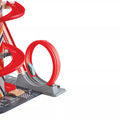 Hape Gearhead Stunt Garage red spiral ramp and loop with a toy car