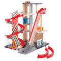 Hape Gearhead Stunt Garage – multi-level wooden car garage with ramps, spiral track and toy cars