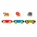 The Hape Jungle Journey Train by HAPE is a wooden toy set featuring three interchangeable train carriages in red, blue, and green. Riding above the carriages are your animal friends: a tiger, a lion, and an elephant. This vibrant set promises endless fun for every little conductor.