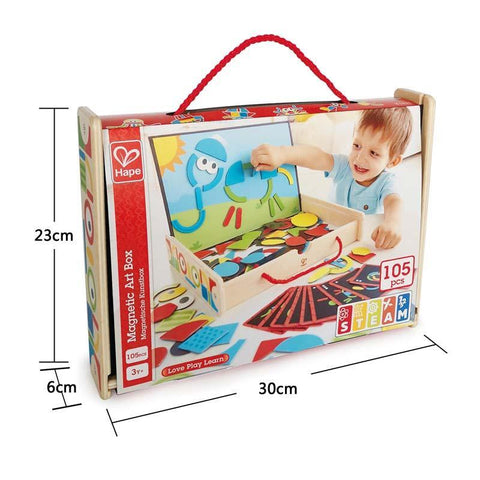 A product photo of the Hape Magnetic Art Box from Hape showcases a child engaging in creativity by arranging magnetic shapes on the board. This magnetic shape picture box, measuring 23 cm in height, 6 cm in width, and 30 cm in length, includes 105 pieces and is perfect for children aged 3 and up.