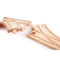 Close-up of two Hape wooden switch track pieces connecting together