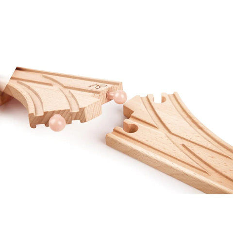 Close-up of two Hape wooden switch track pieces connecting together