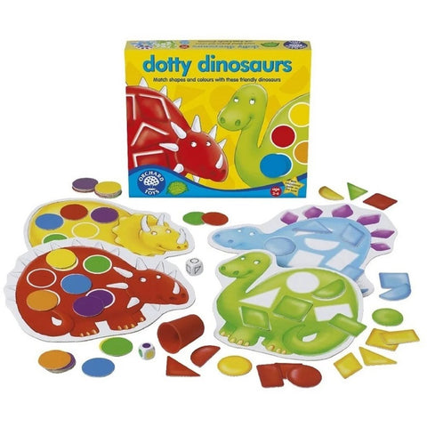 A children's board game titled "Orchard Toys Dotty Dinosaur" by Orchard Toys is shown. The game includes four colorful dinosaur boards, multi-colored shapes, a color die, and a shape die. The dinosaur boards have spaces for placing the shapes that correspond to their colors and shapes.