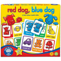 The image shows the box for Orchard Toys Red Dog, Blue Dog by Orchard Toys. The yellow box features illustrations of animals in various colors along with the text "red dog, blue dog." This engaging color match lotto game is designed for very young players aged 2-5 and can be played by 2-4 players.