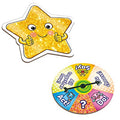 A glittery star character enthusiastically gives two thumbs up, positioned next to the vibrant spinner of the Orchard Toys What a Performance Game by Orchard Toys. The spinner, an integral part of this engaging family board game, features sections labeled "Say!", "Act!", "All Play!", and "Do!", each with a small, animated character illustration. At its center rests a question mark and a pointer.