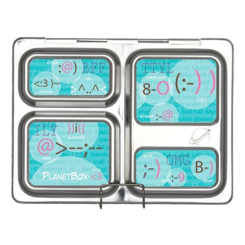 A customizable metal lunchbox with five sections is shown. Each compartment is adorned with blue covers featuring internet slang and emoticons like "BRB," "OMG," ":)," and "<3". Branded "CAMELBAK" and called the "Planetbox Launch Magnet," this lunchbox also offers accessories like lunchbox magnets for personal flair.