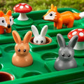 The Smart Games Jump In by Smart Games is a children's toy game that features colorful plastic animals, including three rabbits (orange, white, and gray), two red-and-white mushrooms, and an orange fox. Designed to be a Rabbits game, it incorporates multi-level challenges aimed at boosting cognitive skills, with each figure placed in individual green compartments on the board.